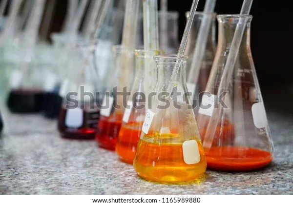 Acetone and isopropyl alcohol bottles near cloth