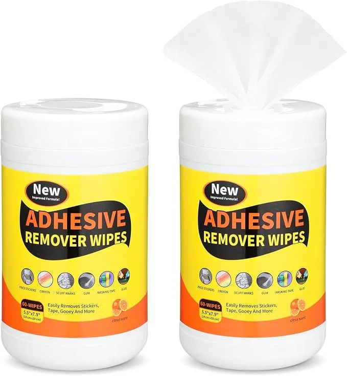 Applying coconut oil to adhesive residue on cotton fabric