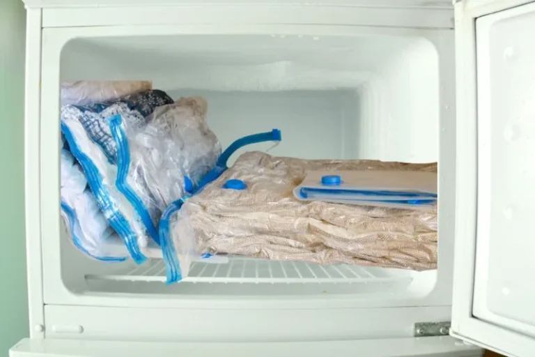 Garment in freezer bag for adhesive removal