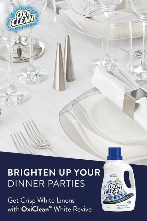 White vinegar and oxygen bleach stain removal products on a laundry table